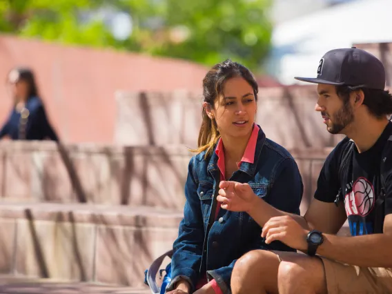 students talking on the University of Arizona campus